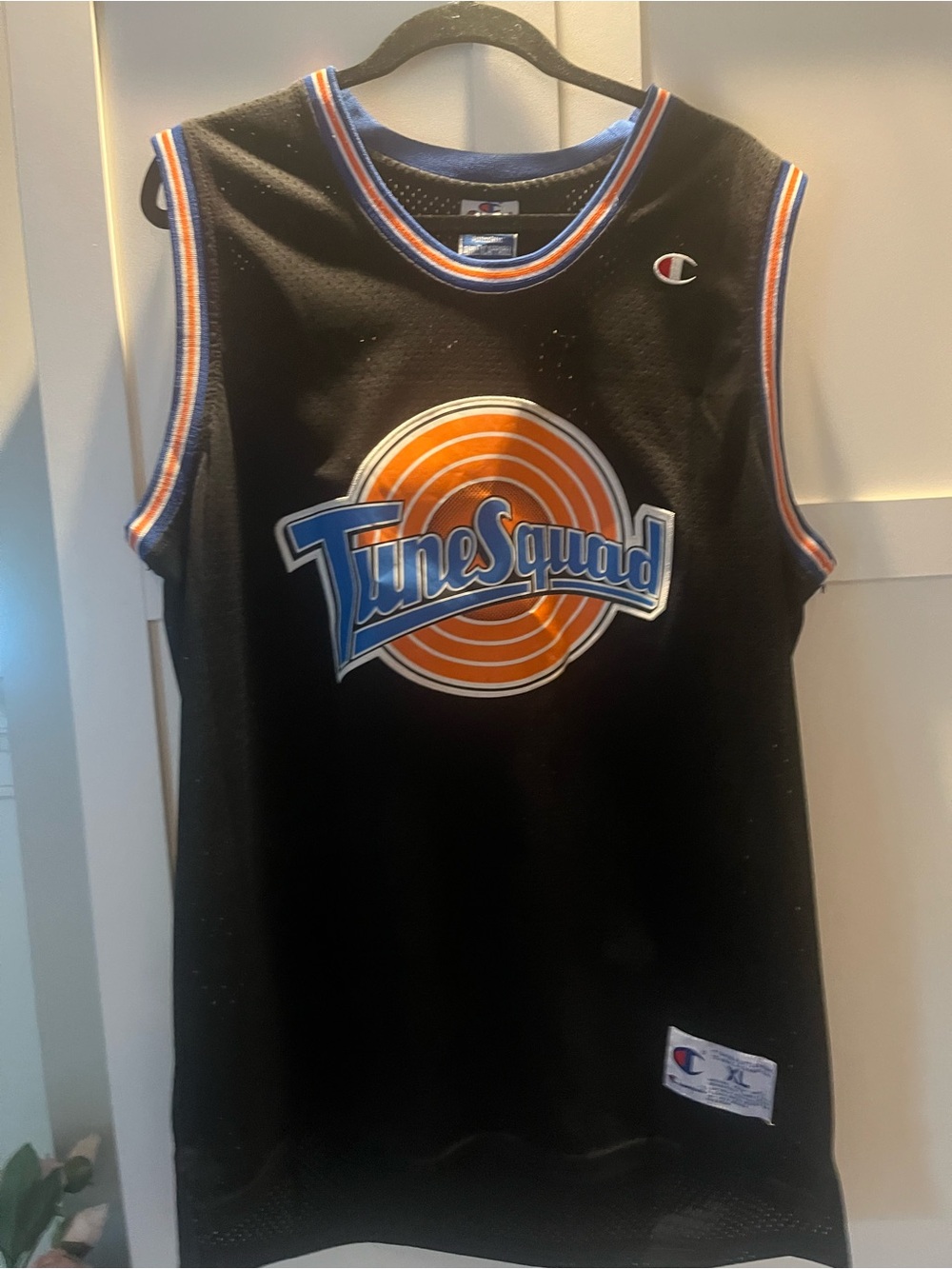 Champion Black Tune Squad Men’s Basketball Jersey with Orange & Blue Logo